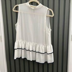 White tank with ruffle bottom